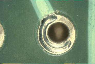 Figure 3: Only part of this through hole pad surface has wetted Figure 3: Only part of this through hole pad surface has wetted
